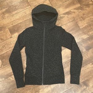 Great condition womens size 4 lululemon scuba hoodie. Green/black leopard camo